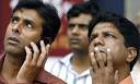 Indian investors watch share prices outside the Bombay Stock Exchange - ind4