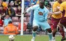 Northamptons giant striker Adebayo Akinfenwa makes critics eat.