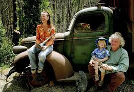 Sonja Parkinson holds the bell of her trombone that was destroyed in the Black Saturday fires, which she survived along with her husband, Colin Buckler, ... - 1411trombone-420x0