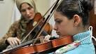 (pic: Violin teacher Elena