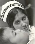 File:Navy nurse aboard the USS
