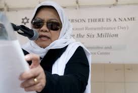 View full sizeBENJAMIN BRINK/The OregonianJosefina “Salma” Ahmad reads at Monday\u0026#39;s Holocaust Remembrance Day ceremony in Pioneer Courthouse Square. - salmaahmadjpg-97448d4750c71c89