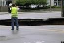 Milwaukee Sinkhole DEVOURS Car As Severe Storms Sweep Through ...