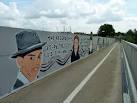 Murals on hairpin bridge - via Daymix
