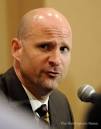 Ole Miss' Andy Kennedy answers questions for members of the media during SEC ... - 8982528-large