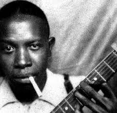 Robert Johnson stands at the - images?q=tbn:ANd9GcSuVqIPUuWSS-jG0JfUT8BjTKnAhPsHlWCNiTpn2aI9ZqNqoavy