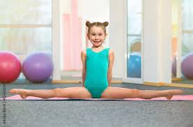 middle school girl gymnast|Cute young girl doing gymnastics Stock 写真 | Adobe Stock