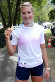 U.S. Olympian rower Meghan Musnicki proudly displays her gold medal from the 2011 World Rowing Championships in Bled, Slovenia. (Photo by Jim Mancari) - DSCN0590