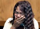 Gladys Wade is overcome on the witness stand during her testimony. - sowell_206