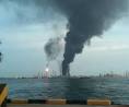 Fire fighting efforts continue on Pulau Bukom - Channel NewsAsia