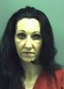 Woman Charged With Mortgage