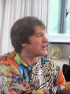 Bild: Dr. Richard Bartlett am Signaturtisch - images?q=tbn:ANd9GcT33ZzvVom65VIqLfNsN1rfjCLuw_oSlJR3RtOWFrbXChTxRTm1eC0mKto