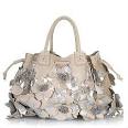 http://www.bagborroworsteal.com/productimages/Handbag/Carlos-Falchi/Slim-Poof-With-Side-Drawstrings_15815_front_large.jpg