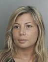 Police said Gina Marks, 37, went as far as convincing a woman that she had ... - 6a00d83451b26169e20120a942f86d970b-320wi