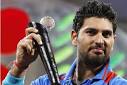 (Yuvraj Singh poses with…) MUMBAI: Dropped from the Indian team only last ... - 7856355