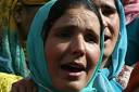 Kashmiri women cry during the funeral of Ghulam Mohammad one of the four ... - 9353f9477ed5b06a217cd4c058fc_grande