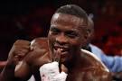 Peter Quillin shows his missing tooth after defeating Jason Lehoullier by a ... - Amir+Khan+v+Zab+Judah+CRluVIj8BJ4l