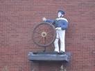 Emblem of Helmsman (W.B. Bawn Ltd), providers of lockers, - via Daymix