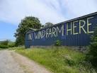Protest slogan at The Ashes. Anywhere else but these hills, eh? - via Daymix