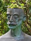 Unusual Hairstyle. This statue in the gardens at House of Pitmuies has - via Daymix
