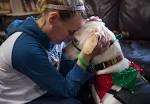 Therapy dog brings joy to Vancouver homeless shelter on Christmas ...