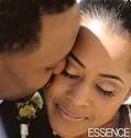 Ed kissing his bride, Lisa.