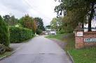 The entrance to the headquarters of the National Rifle Association at Bisley - via Daymix