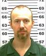 Police converge on NY town where escaped prisoners said sighted.