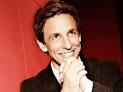 (Seth Meyers, his face frozen