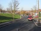 The road to the left is the A1400 Woodford Avenue between "Charlie Brown's - via Daymix