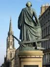 Alexander Stoddart's statue of Adam Smith faces the Tron Kirk in the High - via Daymix