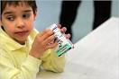 Gabriel Reyes, 6, finishes off a carton of low-fat milk at a public school ... - milk.533span