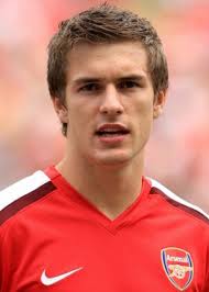 Name : Aaron James Ramsey. D.O.B : 26 Dec 1990 (age 18). Height : 180 cms. Birth Place : Caerphilly, Wales. Playing Positions : CM, AM, RM - aaron-ramsey