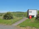 This toilet is in the car park at the northern end of Port Logan Bay. - via Daymix