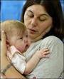 Alessia Di Matteo and mother. Alessia would have died without surgery - _39943609_baby_ap250body