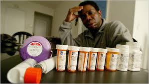Marvin Bethea, seen here in 2004 with some of the 13 medications he takes, is one of the workers the possible legislation would affect. - ground_zero.span_cityroom