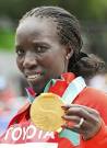 Edna Kiplagat of Kenya holds