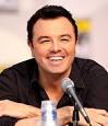 A man (Seth MacFarlane) with black hair, and tan skin with a black