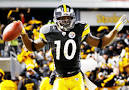 Santonio Holmes falls from