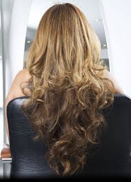 Very long hair extensions in blonde