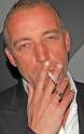 Edwin Veer lookalike John Hannah. "Rookt al 20 jaar. Barclay. Gucci suit." - edwin