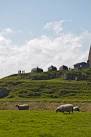 NU1341 : Boat Huts below Lindasfarne Castle from Bible Law. near to Holy - via Daymix
