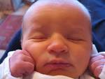 Baby and Toddler  newborn baby girl three 3 days old face closeup