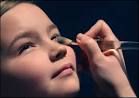 Tori Allen, 9, of Quincy, has her makeup applied by her “big sister” friend, ... - lil-miss205aa