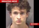 http://ll-media.tmz.com/2011/10/16/1016-mugshot-bn.jpg
