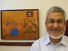 Jaffer Kapasi with a map of