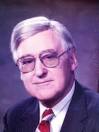 Dr. William “John” Gilbert