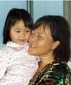 ... Qian Xun Xue is heading to China with her grandmother, Xiaoping Liu. - 77823