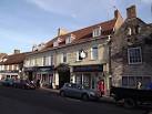 Historic inn and travel agent - via Daymix