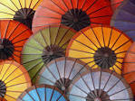 http://theecochef.files.wordpress.com/2011/07/colorful-umbrellas-laos_29407_990x7421.jpg